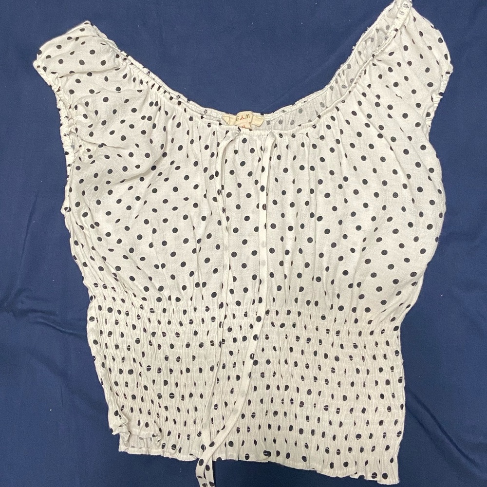 White shirt with black dots